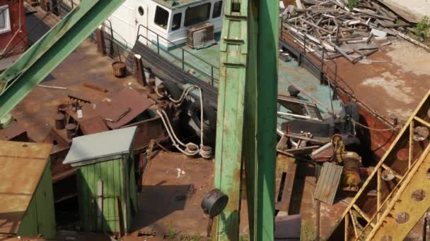 Old River Port on The Dnieper River in Kiev Tilt Up Panorama of the City Cranes Moving White Car Water Buildings on a Horizon Gray Sky Sunny Day Trees — Stock Video