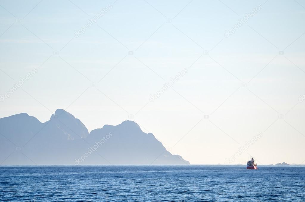 Fishing boat on a horizon