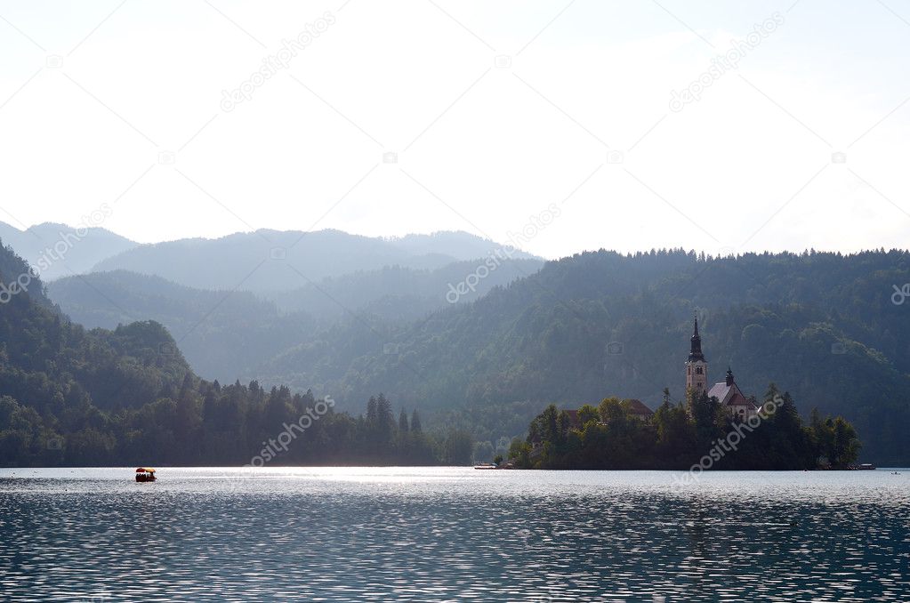 Boat passing over the lake Bled, Slovenia