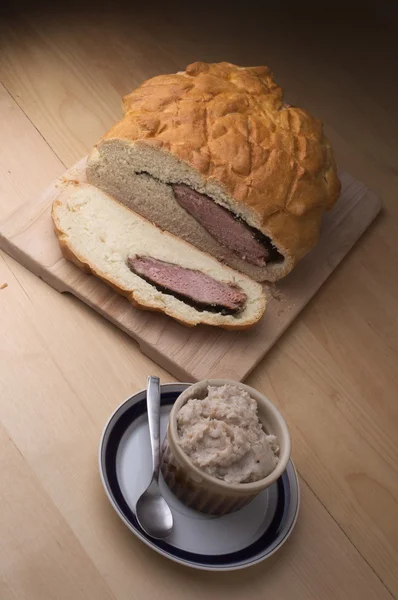 Easter smoked ham baked in bread dough.