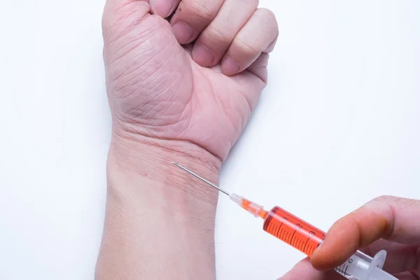 Drug addict man with syringe — Stock Photo, Image