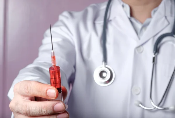 Doctor with syringe — Stock Photo, Image