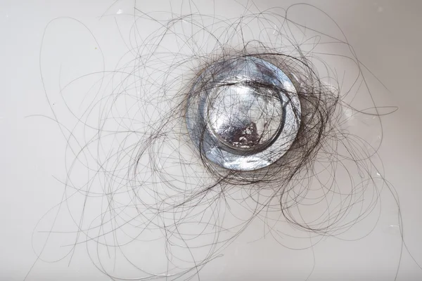 Hair loss problem in sink — Stock Photo, Image