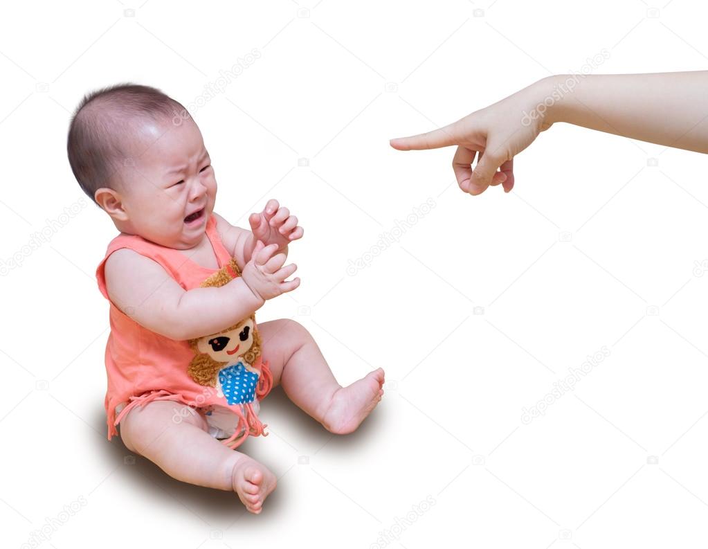 Asian baby crying while mother scolding isolated on white backgr