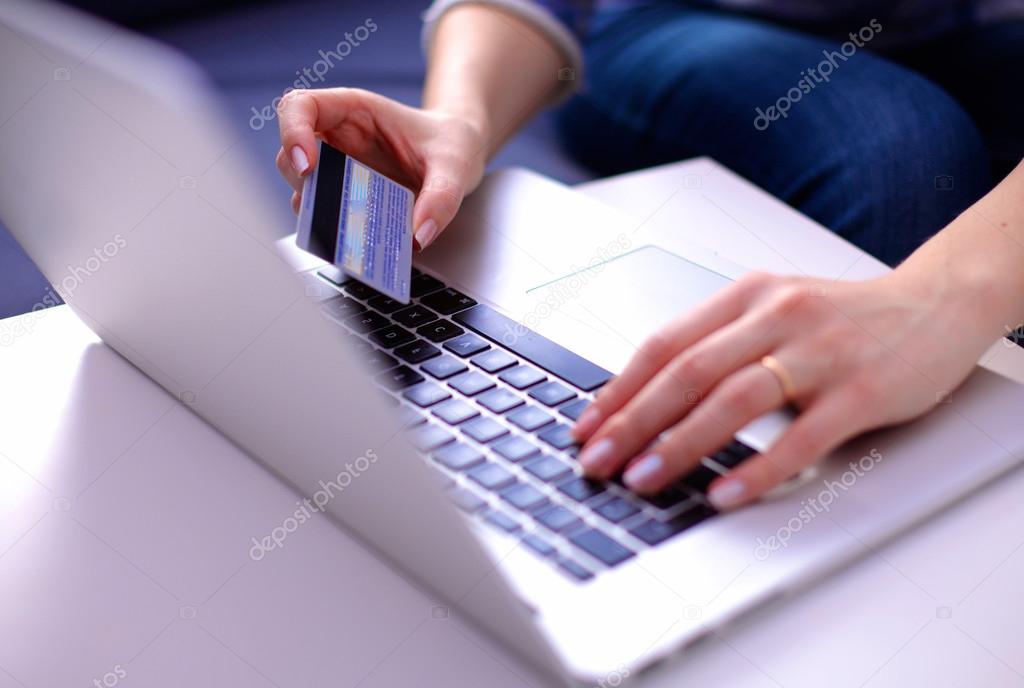 businessman working at a computer hands closeup