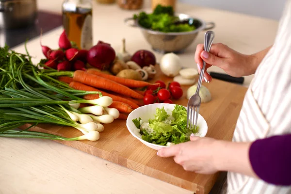 Young Woman Cooking in the kitchen. Healthy Food — Stock Photo, Image