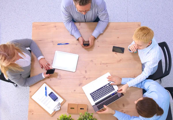 Image of business partners discussing documents and ideas at meeting — Stock Photo, Image