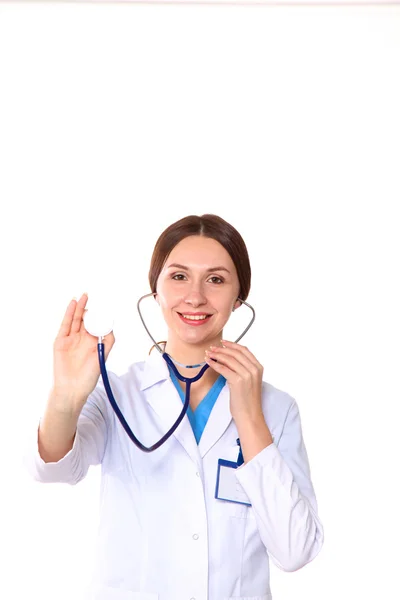 Happy smiling young beautiful female doctor showing blank area for sign or copyspace, isolated over white background Stock Image