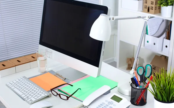 Table designer working space with a computer and paperwork — Stock Photo, Image