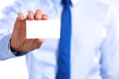 İş kartı - gri arka plan üzerinde atış closeup gösteren el mans