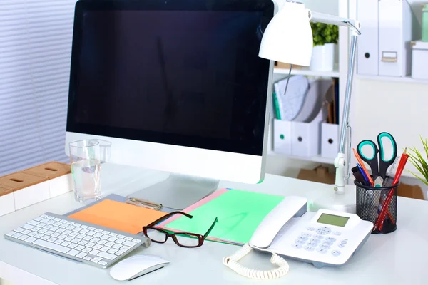 Designer working desk with a computer and paperwork — Stock Photo, Image