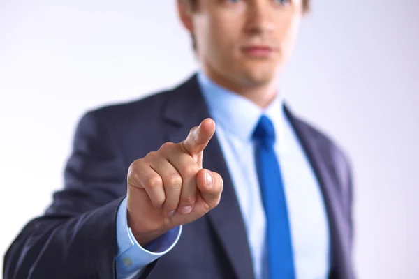 Joven hombre de negocios señala con el dedo un objeto — Foto de Stock