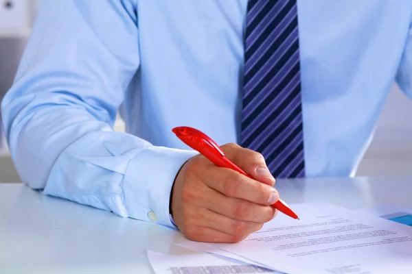 Businessman working at a desk computer graphics — Stock Photo, Image