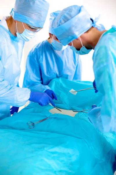 Teamchirurg aan het werk in de operatiekamer — Stockfoto