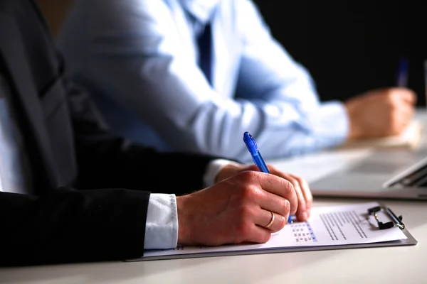 Business people sitting and discussing at business meeting, in office — Stock Photo, Image