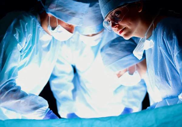 Team surgeon at work in operating room — Stock Photo, Image