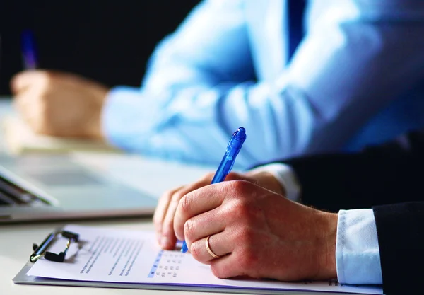 Business people sitting and discussing at business meeting, in office — Stock Photo, Image