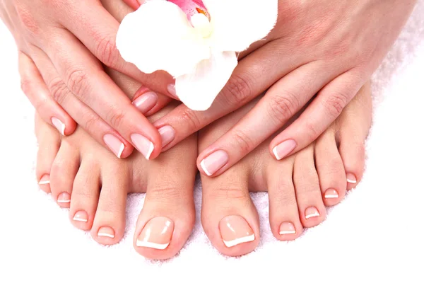 Closeup photo of a female feet at spa salon on pedicure procedure — Stock Photo, Image