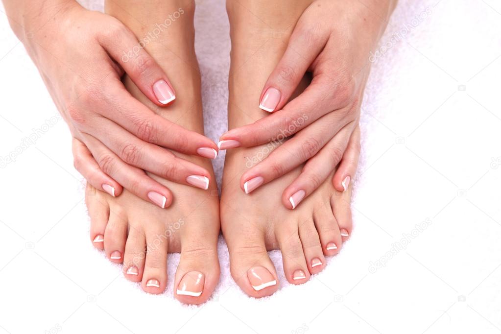 Closeup photo of a female feet at spa salon on pedicure procedure