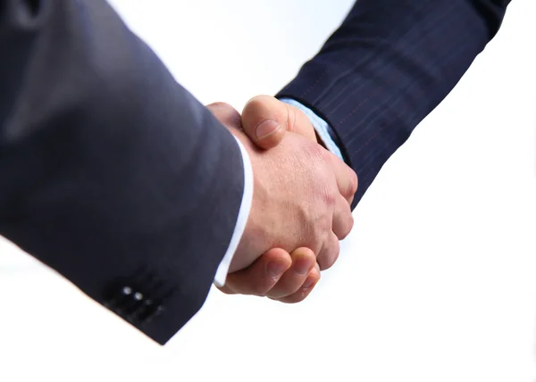Un apretón de manos. Dos hombres de negocios estrechándose la mano en la oficina —  Fotos de Stock