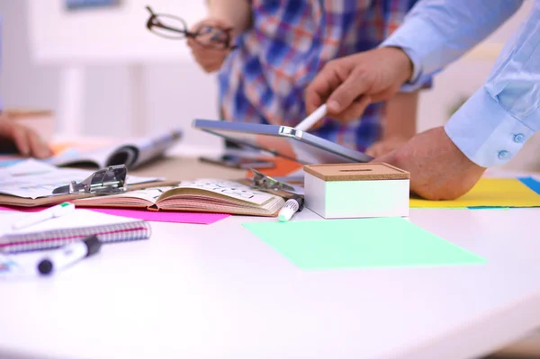 Close-up of three young creative designers working on project together. Team work — Stock Photo, Image