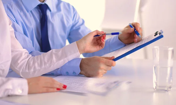 Image of two young businessmen using touchpad at meeting — Stock Photo, Image