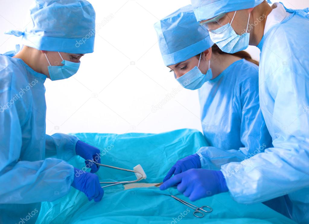 A team of surgeons at work in the operating room