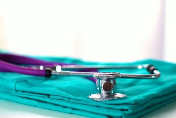 Stetoskop på en bakgrund av medicinska kappa — Stockfoto