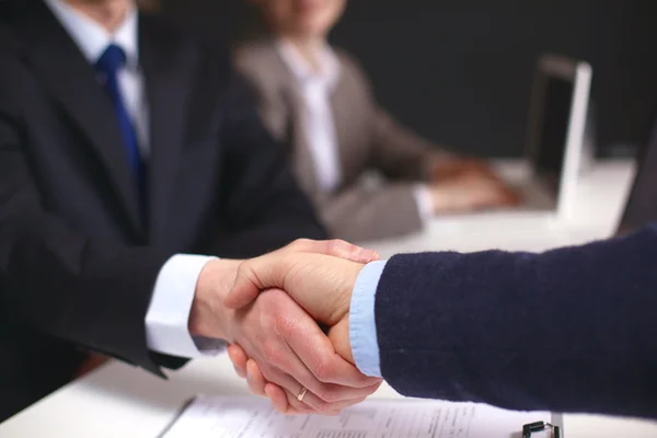 Business handshake. Two businessman shaking hands with each other in the office — Stock Photo, Image