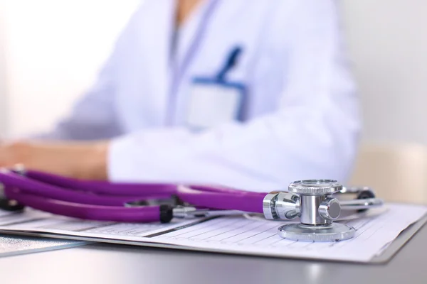 Female doctor at the office of the table — Stock Photo, Image