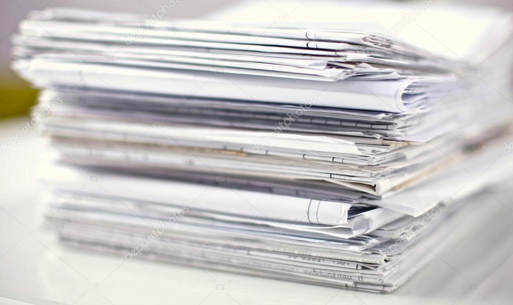 Large Stack Of Papers On A White Background Stock Photo - Download