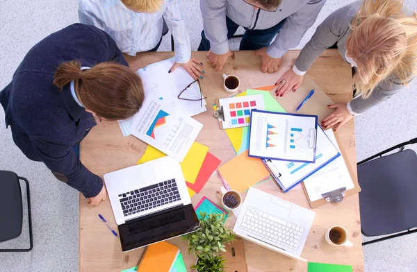 Image of business partners discussing documents and ideas at meeting — Stock Photo, Image