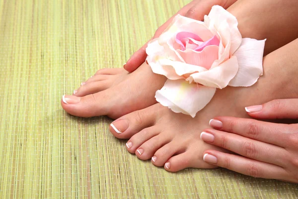 Closeup photo of a beautiful female feet with pedicure — Stock Photo, Image