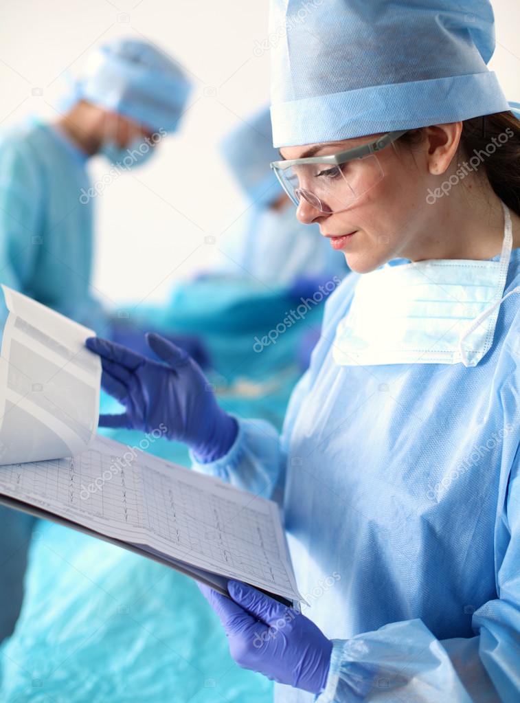 Team surgeon at work in operating room