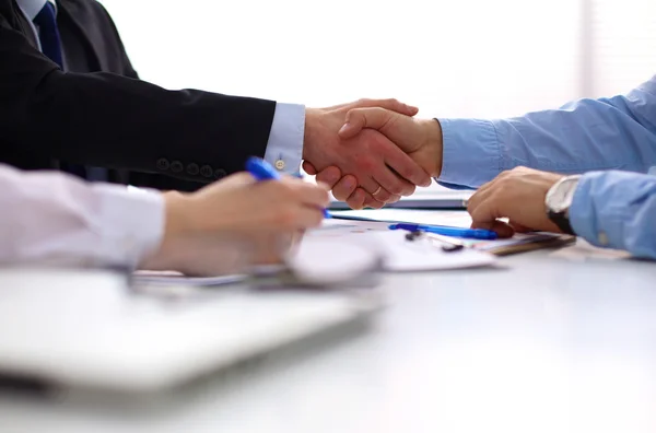 Business handshake. Two businessman shaking hands with each other in the office — Stock Photo, Image