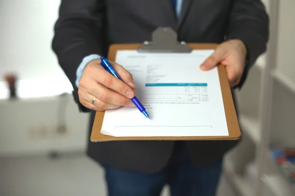 File folders, standing on  shelves in the background — Stock Photo, Image