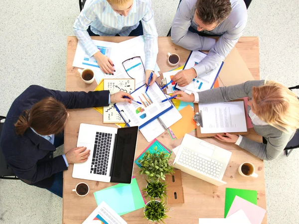 Image of business partners discussing documents and ideas at meeting — Stock Photo, Image