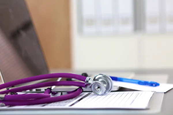 Stethoscope on cardiogram concept for heart care on the desk — Stock Photo, Image