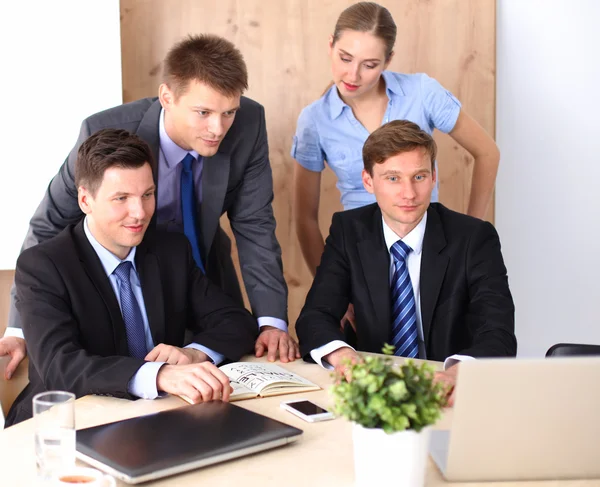 Business meeting -  manager discussing work with his colleagues Stock Image