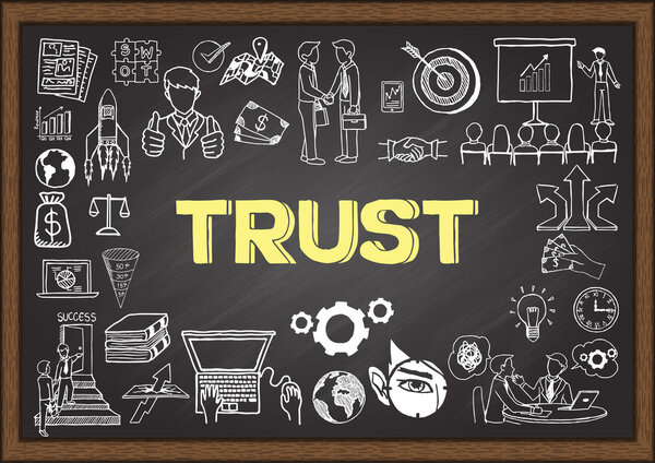 Doodles about trust  on chalkboard.
