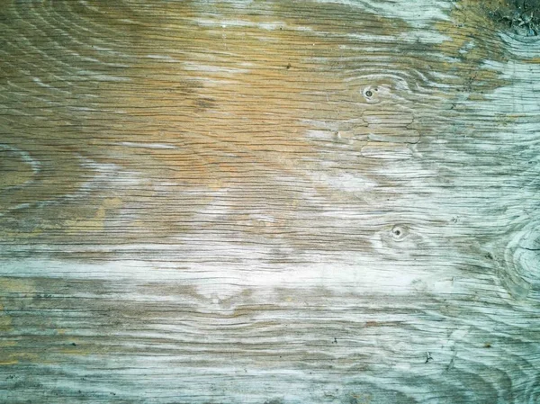 古い木製の壁のライトグレーとライトブラウン 川が流れているように 2つの小さな木製の目があります 汚い床 乾燥した土壌の汚れ 背景の質感 — ストック写真