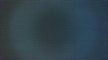 Küçük dijital piksellerin ızgarasını gösteren mavi bir LED ekranın soyut dokusunu yakından çek. Teknoloji televizyonu ve elektronik ekran arka plan temaları için mükemmel
