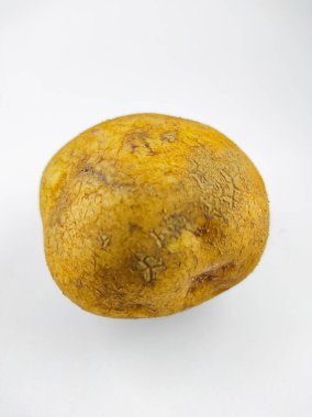 Photo of fresh potatoes isolated on a white background in mini studio