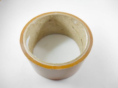 Photo of brown duct tape isolated on white background in mini studio