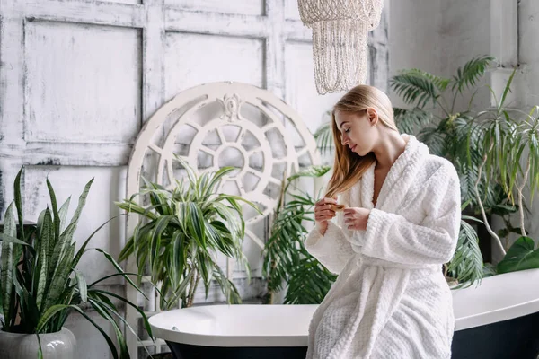 Haircare Treatment Concept Calm Young Woman White Soft Bathrobe Holding — Photo