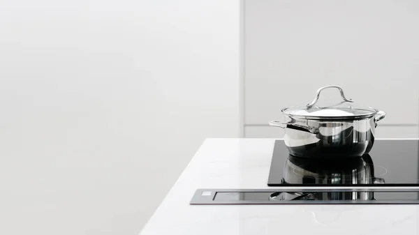 Metal Pot Being Heated Fancy Glass Induction Stove Built White — Zdjęcie stockowe