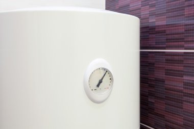 Closeup of temperature sensor in Electric Boiler (wall water heater) clipart