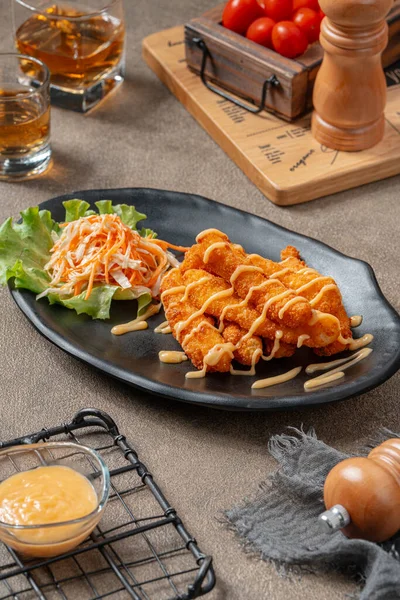 Balık kroket ya da morina balığı gibi morina balığından yapılmış balık kroket. Genellikle tartar sosu, kokteyl sosu ya da ketçap ile yenirler..