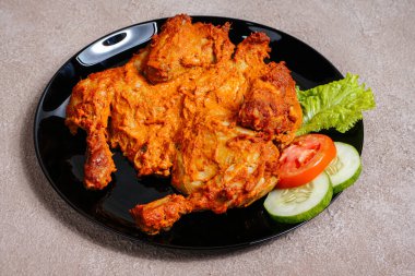 Rendang Ayam ya da Chicken Rendang, Endonezya 'nın Batı Sumatra kentinde bulunan bir Endonezya yemeğidir.. 