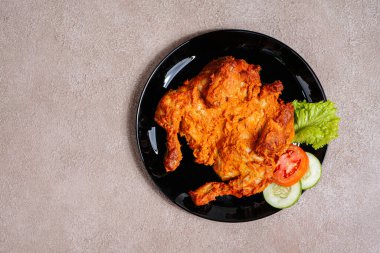 Rendang Ayam ya da Chicken Rendang, Endonezya 'nın Batı Sumatra kentinde bulunan bir Endonezya yemeğidir.. 